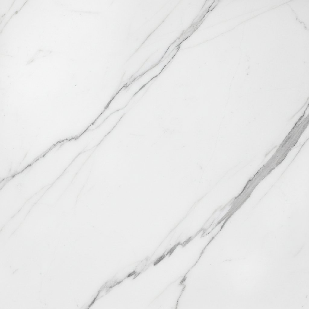 Polished Statuario marble slab showing crisp grey veining over brilliant white field