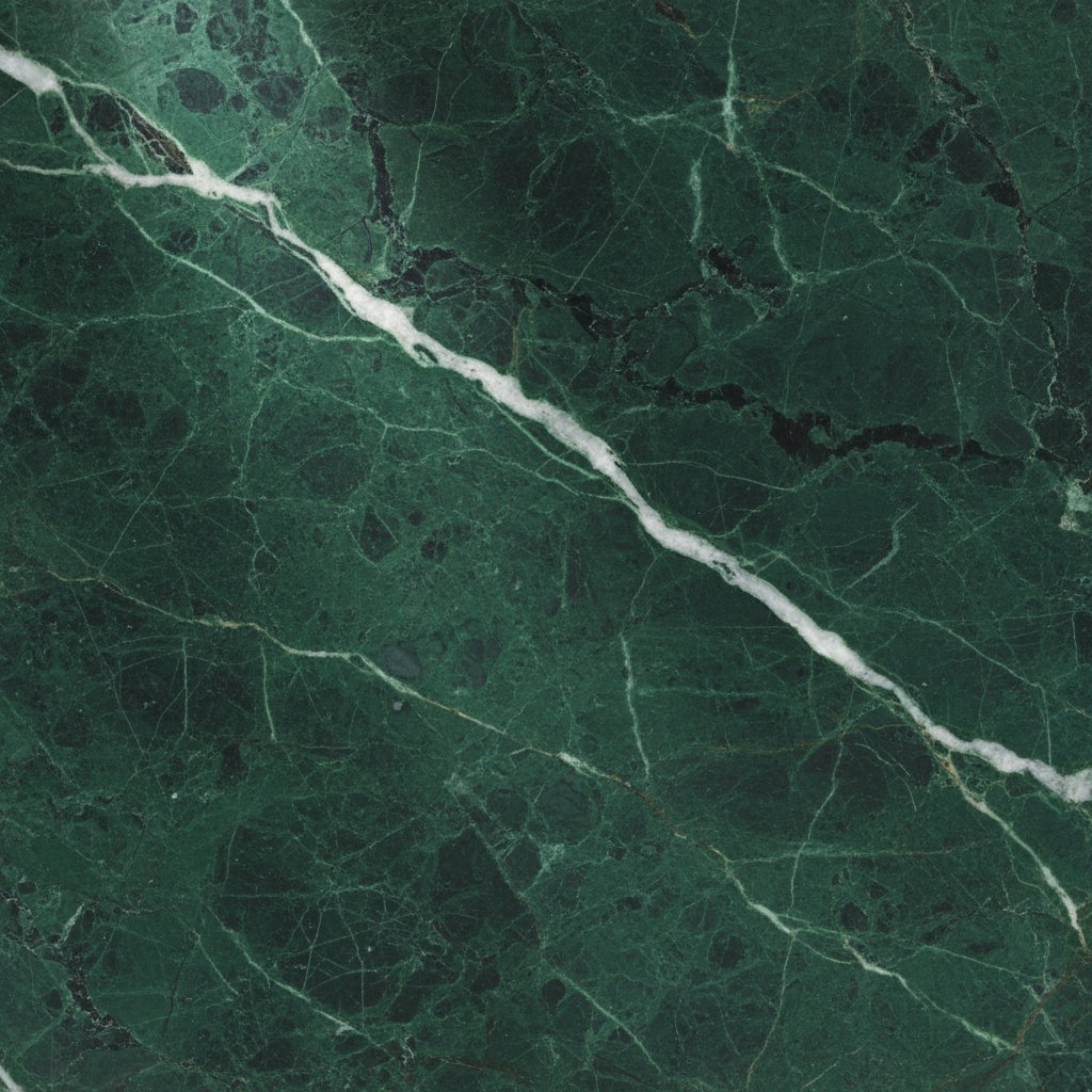 Polished Verde Guatemala marble slab showing white veining over deep green field